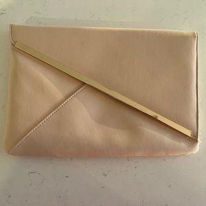 Blush pink ASOS clutch purse with gold accents